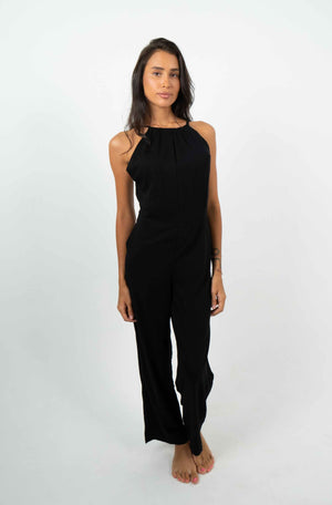 
            
                Charger l&amp;#39;image dans la galerie, Fluid backless black jumpsuit. Gathered elastic waistband.
            
        