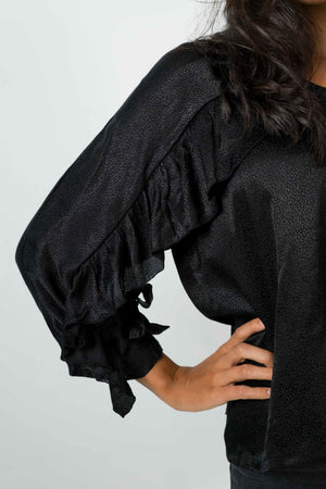 
            
                Charger l&amp;#39;image dans la galerie, Backless black shirt. With wide long sleeves This shirt is in textured satin.
            
        