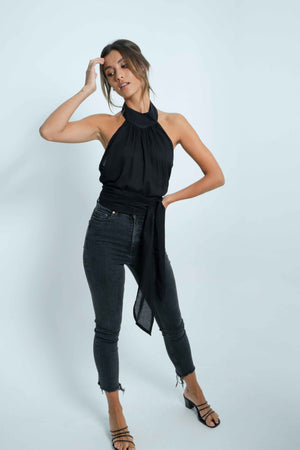 
            
                Load image into Gallery viewer, Casual and chic outfit with jeans and black top to tie at the neck and bare back. 
            
        