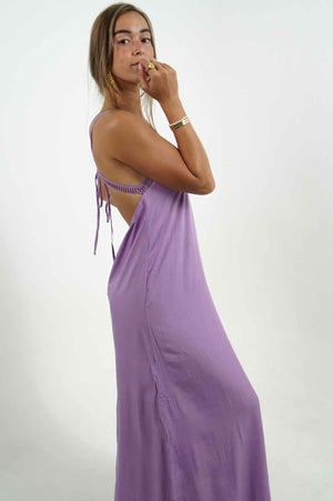 
            
                Load image into Gallery viewer, Purple long open back dress. Adjustable straps and an opening on the side. Pretty details on the neckline.
            
        