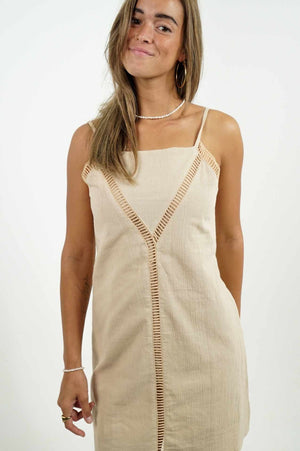 
            
                Load image into Gallery viewer, Casual and elegant dress by Back Cartel in beige. Cute details at the front.
            
        