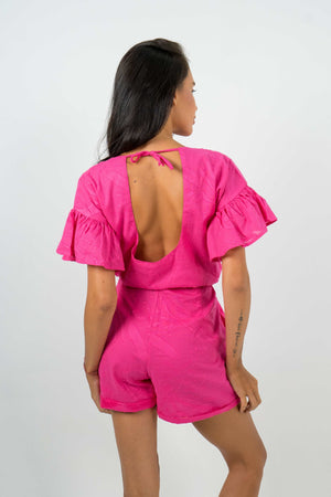 Open back midday playsuit in pink from Back Cartel, the french brand specialised in backless outfits.