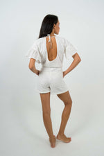 open back short playsuit with lace at the neck and patterned cotton fabric