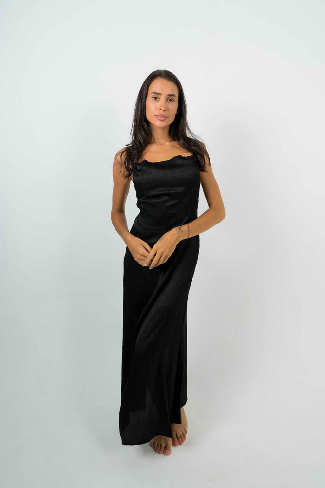 
            
                Load image into Gallery viewer, long party dress in black. All in viscose. Very sexy dress by Back Cartel
            
        