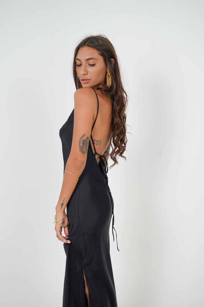 Cute backless dress with self-tie-back in black.
