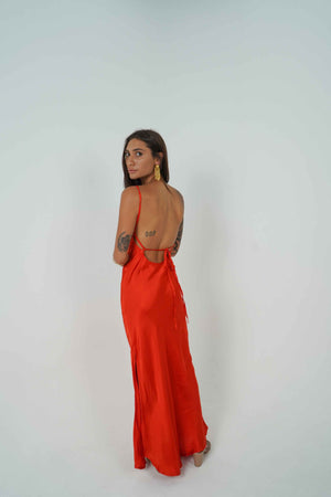 Long sexy dress in red by Back Cartel. We like your front but we love your back.