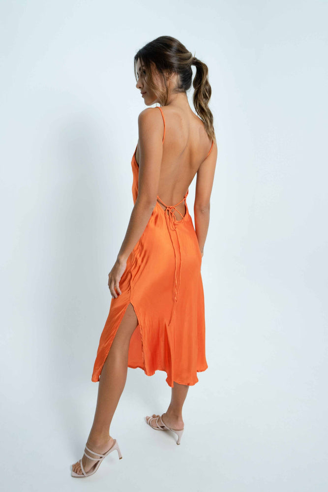 
            
                Load image into Gallery viewer, Pacar mid long dress with wide open back by Back Cartel. Orange is the new black.
            
        