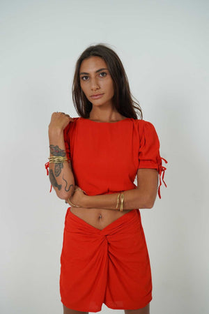 Red mini skirt and top set. Fully lined and viscose mini skirt in a firing red colour. 