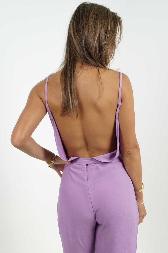 Beautiful bareback jumpsuit by Back Cartel. This purple colour will be perfect for a spring wedding.